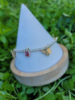 Butterfly with red evil eye  Cristal bracelet